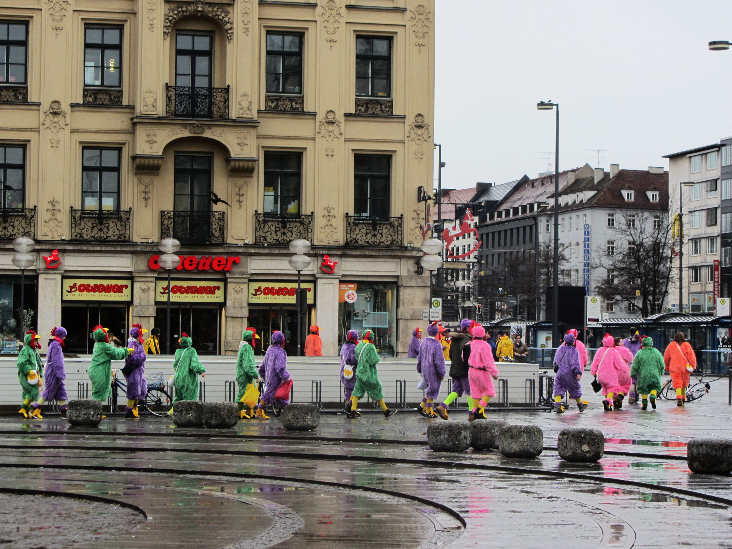 Group of people in Munich's historical center randomly dressed as stuffed animals.