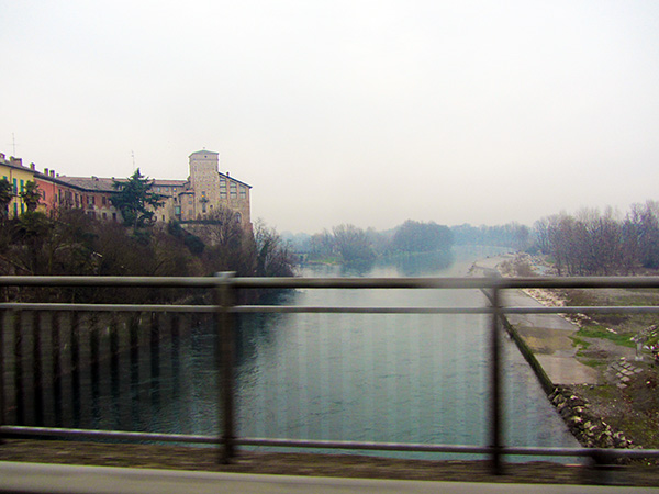 Crossing the bridge in Cassano D'Adda, surrounded by typical Milan-esque weather.