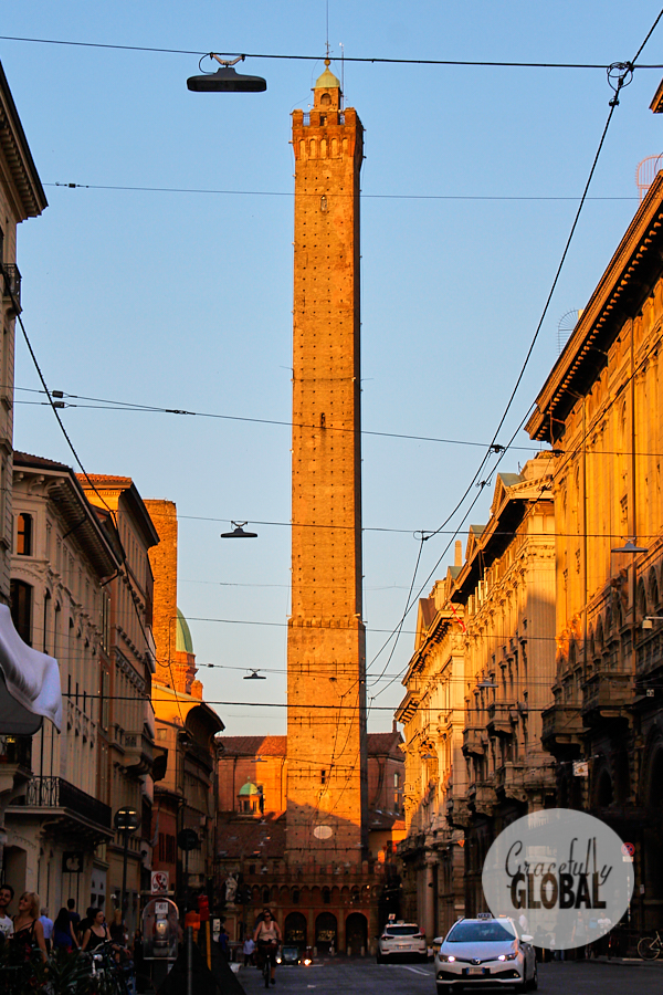 Bologna, Italy's two towers light up in the late afternoon sun.